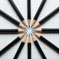 Pencils in a Circle on Graph Paper Royalty Free Stock Photo