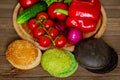 Top view closeup of three different hamburger buns with vegetables. Black, green, yellow buns. Royalty Free Stock Photo