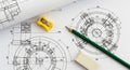 Engineering blueprints with a pencil, sharpener, and eraser Royalty Free Stock Photo