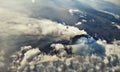 Top down view flying above an active smoking volcano in Equador