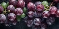 Top down view of fresh red grapes with drops of water