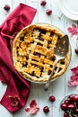 Top down view of a freshly baked cherry pie with a pie server. Royalty Free Stock Photo