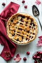 Top down view of a freshly baked lattice cherry pie ready for serving. Royalty Free Stock Photo