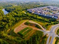 Top-down view of a green forest, a river and a residential area Royalty Free Stock Photo