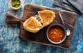 Top down view of a grilled cheese sandwich with tomato soup, ready for eating. Royalty Free Stock Photo