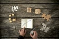 Top down view of hands using a compass Royalty Free Stock Photo