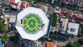 Top down view of helicopter landing pad on the roof of modern skyscraper in Jakarta city