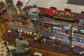 Top-down view of a man sitting at the sports bar counter and enjoying alcoholic beverages.