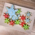 Top down view of mini snowflake sugar cookies for winter or Christmas Royalty Free Stock Photo