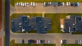 Top down view on multi-family houses and parking with cars Royalty Free Stock Photo