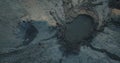 Top down view over mud volcanoes and lunar looking landscape