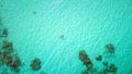 Top down view person swim crystal turquoise water