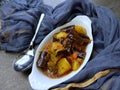 Top down view of a plate of Gluten free and vegan Eggplant and Potato curry or fry