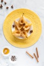 Top down view of poached and torched pears along with cinnamon sticks, star anise, a bowl of cloves and honey. Royalty Free Stock Photo