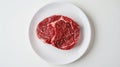 A top-down view of a raw chuck eye steak Royalty Free Stock Photo