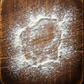 Flour Dusting on Rustic Wooden Surface Royalty Free Stock Photo