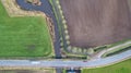Top down view, shot with a drone of the Landscape with road and bridges over the river Aa, Herentals, Belgium, running