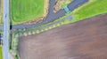Top down view, shot with a drone of the Landscape with road and bridges over the river Aa, Herentals, Belgium, running Royalty Free Stock Photo