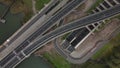 Top down view of tunnel and highway infrastructure and shipping waterway in Rotterdam, The Netherlands. Botlekbrug and