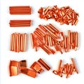 A top down view of various copper pieces including tubes and flat sheets on a white background surface Royalty Free Stock Photo