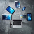 Digital Devices Displaying Data Analytics on a Modern Desk Royalty Free Stock Photo