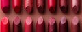 Top-down view of various shades of red lipsticks in a matte finish Royalty Free Stock Photo