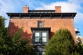 The top of an elegant brick house in Brooklyn Heights, NY. Royalty Free Stock Photo