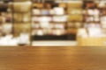 Top of empty of wood table with Blurred background of modern bookstore and stationary store interior. Using for Mock up template f Royalty Free Stock Photo