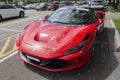 Top front side view of red Ferrari F8 Tributo . Mid-engined rear drive car Royalty Free Stock Photo