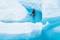 On top of a glacier is a dangerous place to paddle a canoe, but also a beautiful place to see from a new angle Royalty Free Stock Photo