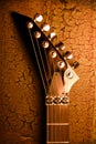 Top of guitar over grunge background Royalty Free Stock Photo