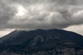 The top of a high mountain in the clouds. The weather is cloudy Royalty Free Stock Photo