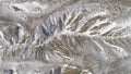 Top of High mountains, covered by snow. Shot. Top view of the snowy hill. Beautiful landscape Royalty Free Stock Photo