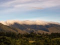 The top of the Iguaque mountain covered by a dense cloud at sunset Royalty Free Stock Photo