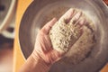 Top view of a hand full of rye flour Royalty Free Stock Photo