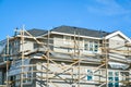 Top of large residential house in trestles. Royalty Free Stock Photo