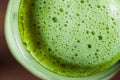 Top macro view matcha green tea latte