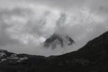 The top of the mountain in the fog. Hiking travel outdoor concept, journey in the mountains, Kals am Grossglockner, Austria