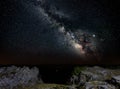 At the top of the mountain. Above the Milky Way and below a farm. Royalty Free Stock Photo