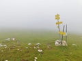 Top of mountain in austrian alpes in mist