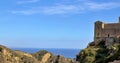 At the top of the mountain, church, around the hill and in the distance a view of the sea, Italy, Sicily, Savoca