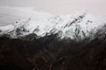 Top of the mountains of the Apuan Alps covered with white snow