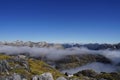 On top of mountains in Fjordland National Park - Doubtful Sound - clouds Royalty Free Stock Photo