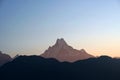 Top of Mt. Machapuchare is a mountain in the Annapurna Himalayas of north central Nepal seen from Poon Hill, Nepal Royalty Free Stock Photo