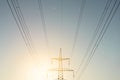 Top old electrical pillar on a background of the blue sky