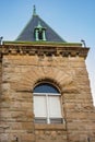 Top of Old Stone Tower. Facade of ancient building with window