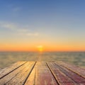 Top of old wooden table with blur sunset background