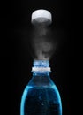 Top of open plastic bottle with carbonated mineral water Royalty Free Stock Photo