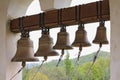 On top of Orthodox Christian monastery bell tower, Russia, Adygea, Saint Michael`s Monastery. Church bells hang in row