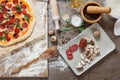 Top view cooking pizza with ingredients, tomatoes, salami and mushrooms on wooden tabletop Royalty Free Stock Photo